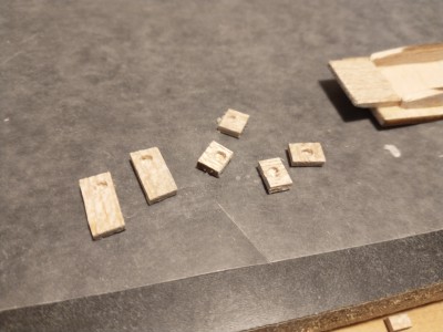 Balsa blocks cut for holding magnets.